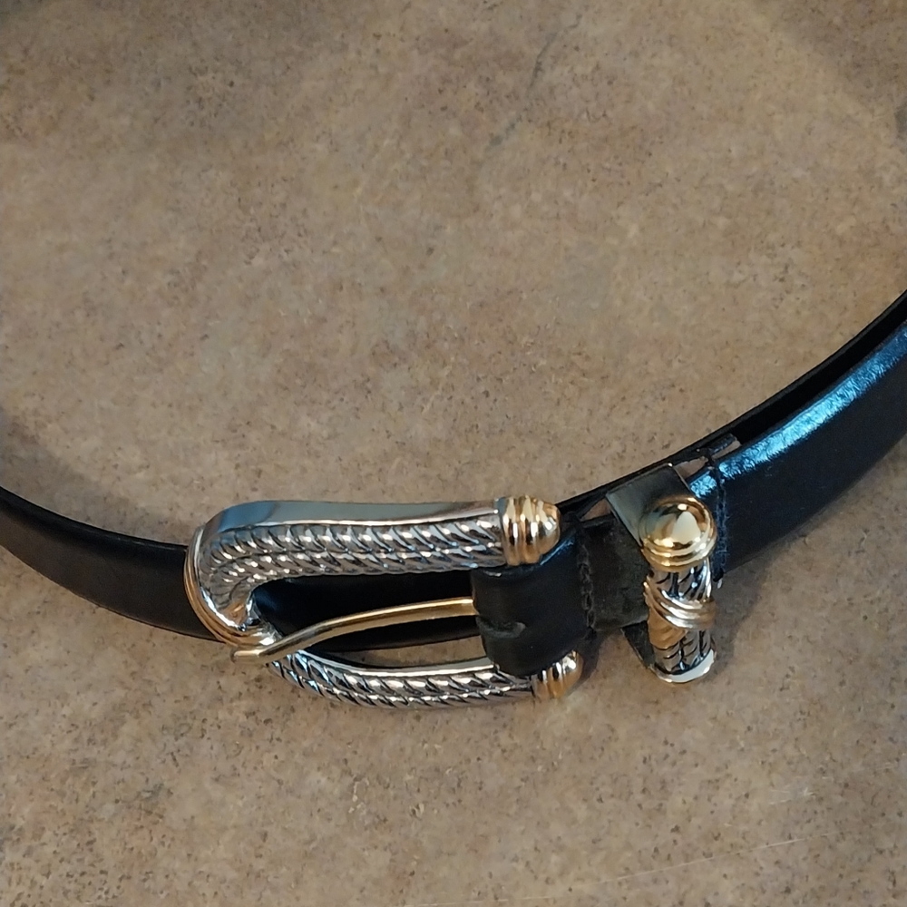 Black Millennium Genuine Leather Belt.  Buckle has beautiful silver & Gold tones